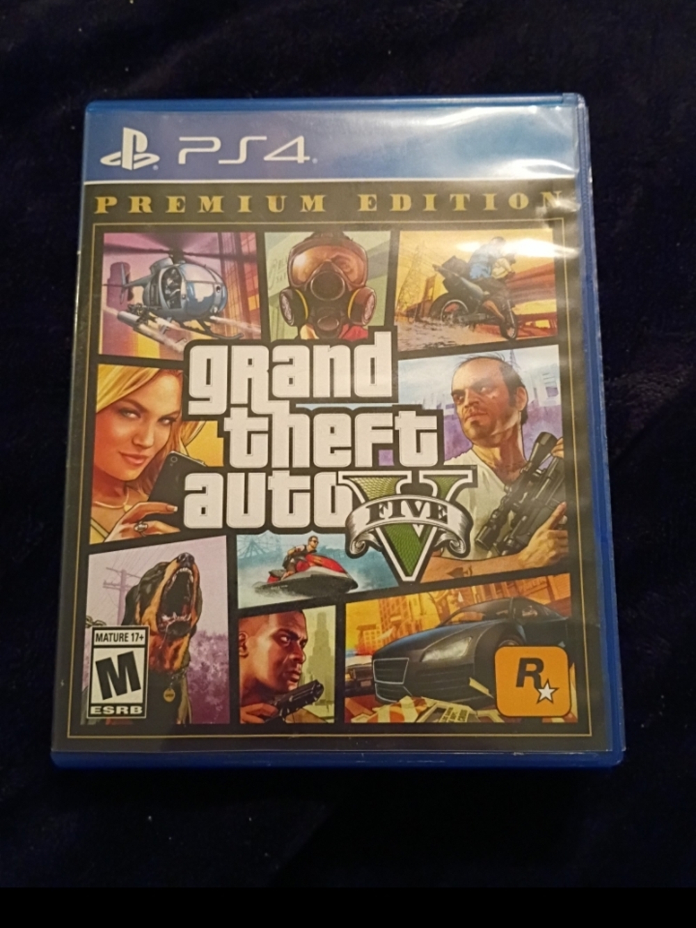 Grand Theft Auto PlayStation 4 game in good condition.